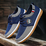 Elevate Your Walk: English-Style Men's Canvas Sneakers - Comfortable, All-Season, Solid-Color Lace-ups provain