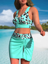 Provain Shop Plus Size Chic Cow Print Bikini Set - Flirty Tie Front Top with Criss Cross Back & Lace-Up Skirt Bottoms - Beach & Poolside Essentials 